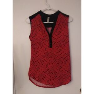 Red sleeveless top